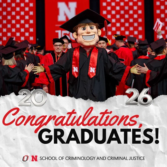 Crumpled white paper background. Upper half of post is graduation photo with Husker mascot leading graduation procession and giving out high fives. Text reads: Congratulations, Graduates! 20 is to the left of the words and 26 is to the right of the words. SCCJ logo at bottom.