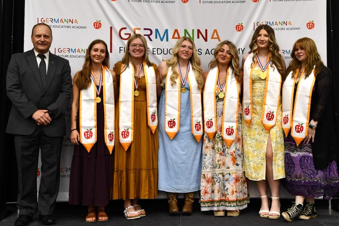 Dr. Tony Brads poses with six Culpeper County Public Schools students during the Future Educators Academy Signing Day celebration. The students, members of the inaugural cohort of the Germanna Future Educators Academy Lab School, announced their plans to continue their teacher preparation programs at four-year universities across Virginia.