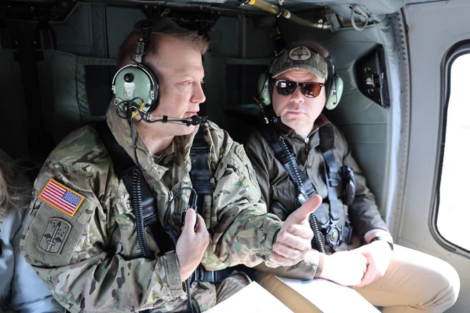 Col. Matthew Chase, U.S. Army Corps of Engineers, St. Paul District, commander, left, briefs Assistant Secretary of the Army for Civil Works Adam Telle on the Fargo, North Dakota/Moorhead, Minnesota, Metro Area Flood Risk Management project, during a helicopter tour May 7.

Honorable Telle and U.S. Army Corps of Engineers Deputy Commanding General for Civil and Emergency Operations Maj. Gen. Jason E. Kelly visited the project and celebrated the signing of an amended project partnership agreement project.

The project exemplifies the USACE Building Infrastructure Not Paperwork initiative. Through effective leadership, the St. Paul District was able to cut red tape, identify and implement efficiencies with strong partnerships and is delivering infrastructure to the region 10 years sooner than the traditional delivery methods. The project is on track to be ready in spring 2027.
