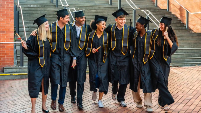 Diverse college graduates walking; overlay text: “Congrats, grads!”   small subhead “We’ll connect during your grace period.”