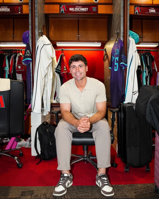 Ryan Waldschmidt smiles at his locker in the clubhouse.