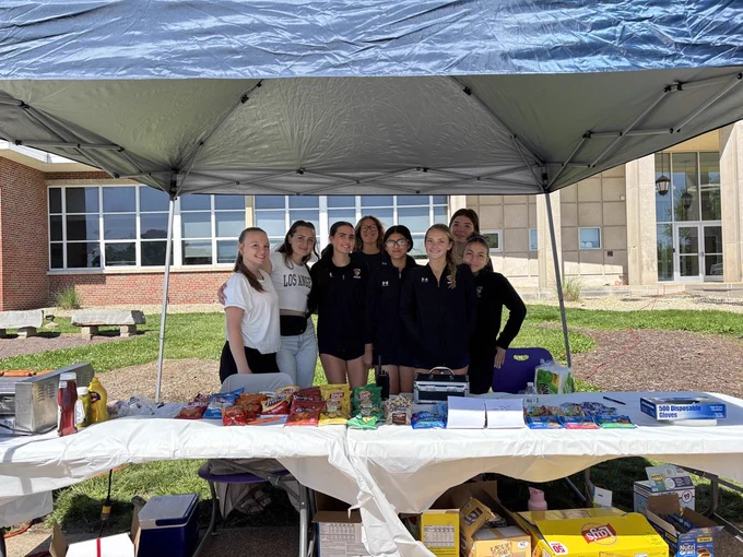 The Girls Soccer Team working concessions at the Flea Market. 