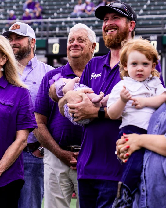 Danny Wheat smiles with his family