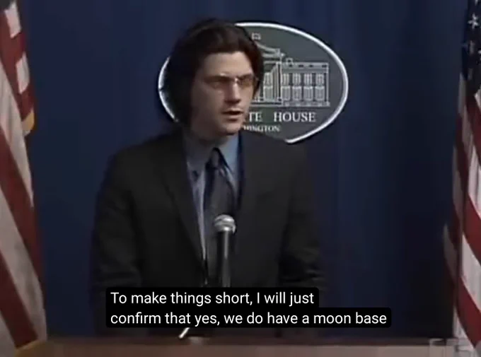 Screenshot from a whitest kids you know episode with Trevor standing infront of a white house press briefing saying "To make things short, I will just confirm that yes, we do have a moon base"