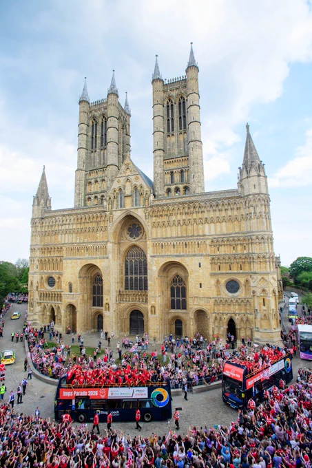 The Imps parade in front of Lincoln Cathedral. 