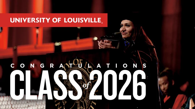 A woman in UofL commencement attire standing and clapping at the commencement ceremony podium with the text "University of Louisville congratulations class of 2026" overlayed