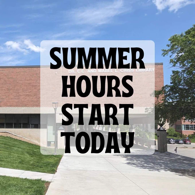 A brick building with a wide sidewalk and underpass. To the left there is a grassy lawn. The overlay text says 'summer hours start today.'