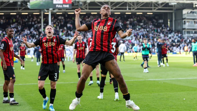 Junior Kroupi celebrates at Craven Cottage.