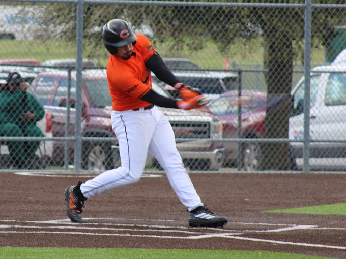 Dallas College Cedar Valley baseball hitter Julio Cuotto makes contact with a ball. Cuotto had three hits, including a home run and a triple in Saturday's win. 
