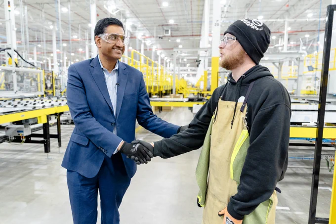 Rep Khanna shaking hands with a First Solar employee at First Solar factory in Ohio.
