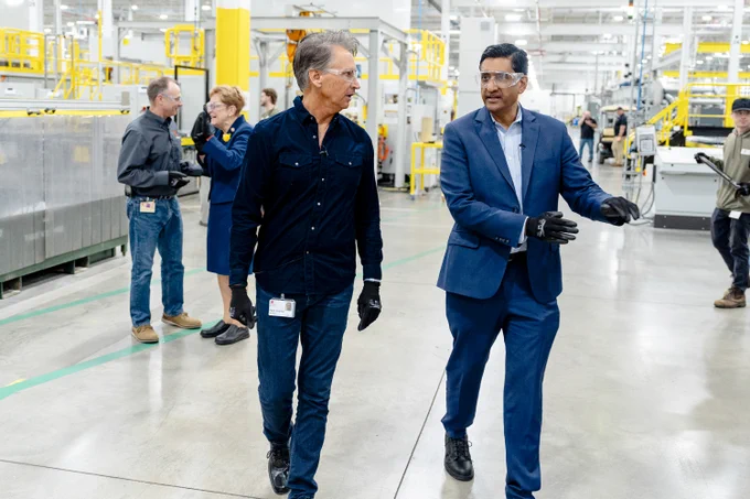 Rep Khanna and CEO Mark Widmar touring First Solar's factory in Ohio.