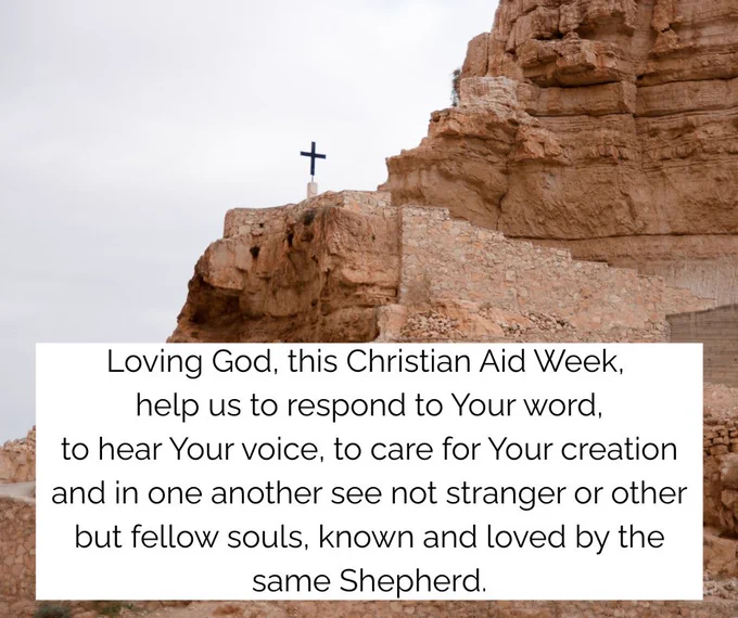 Stone cliff with a black cross atop, symbolizing faith against a cloudy sky backdrop with the words:
Loving God, this Christian Aid Week, 
help us to respond to Your word,
to hear Your voice, to care for Your creation
and in one another see not stranger or other
but fellow souls, known and loved by the same Shepherd.