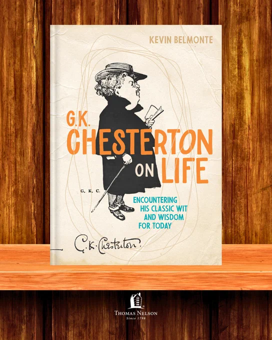 Book cover titled "G.K. Chesterton on Life" by Kevin Belmonte. It features an illustrated figure holding a book, with the text "Encountering His Classic Wit and Wisdom for Today." G.K. Chesterton's signature is at the bottom. The publisher, Thomas Nelson, is noted at the base. The background is a wooden texture.
