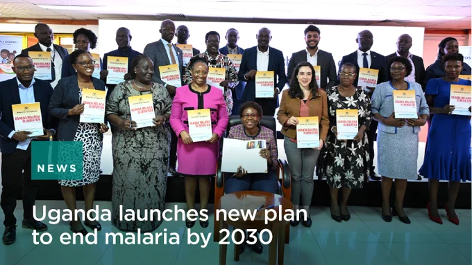 Group photo of Uganda malaria strategic plan dissemination meeting. Text reads: Uganda launches new plan to end malaria by 2030
