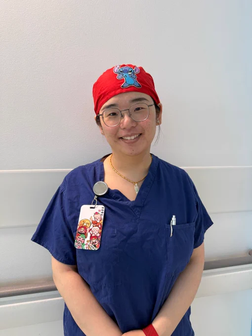 An image of Fiona in her scrubs, smiling
