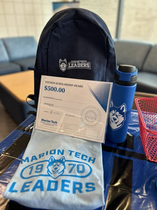 A prize pack including a backpack, $500 tuition voucher, T-shirt and water bottle.