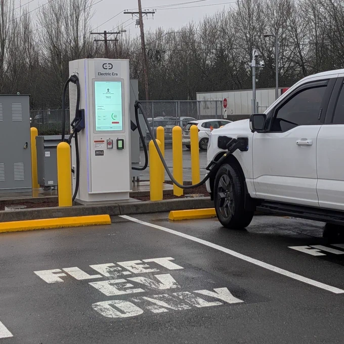 A Ford F-150 Lightning charges at the ElectricEra charging station at the Kent office.