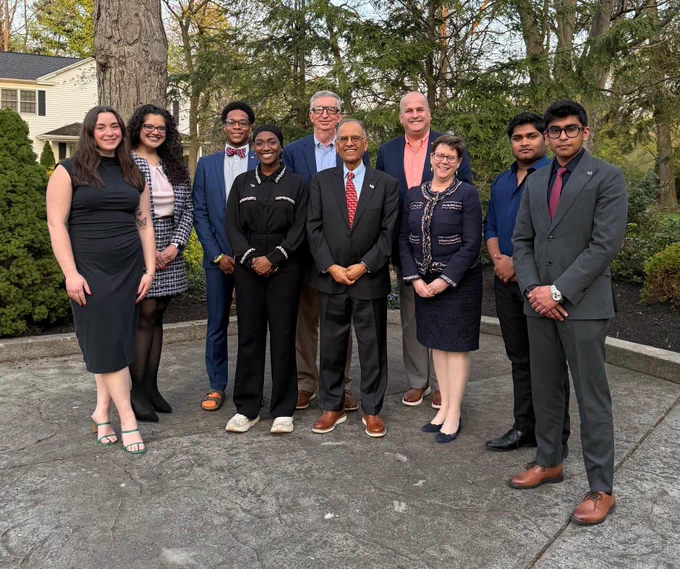 President Tripathi poses for a group photo with members of UB's student government leadership. 