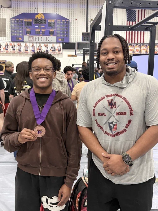 Justis Riggs and Coach Crochran at the regional meet