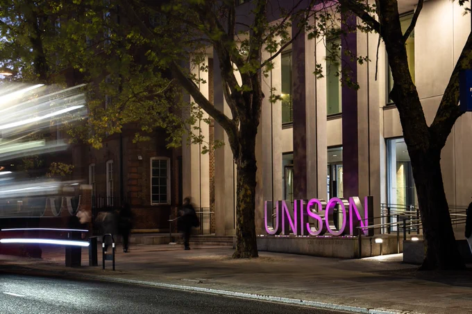 UNISON logo on Euston Road lit in purple for IWMD.