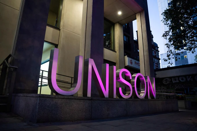 UNISON logo on Euston Road lit in purple for IWMD.
