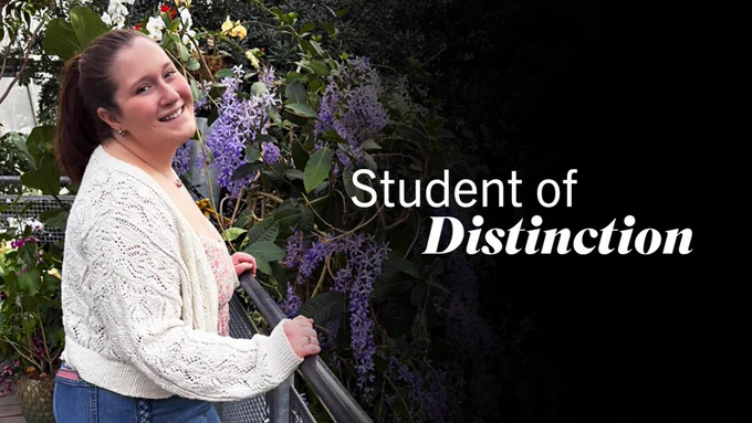 CSU student Emma Barlow posing in an outdoor garden with the words "Student of Distinction" displayed next to her. 