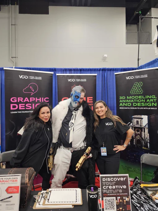 Photo from VCAD’s booth at Calgary Fan Expo showing attendees, cosplayers, and artists engaging in creative activities, character sketch experiences, and interactive design challenges while exploring art, imagination, and community at the event.
