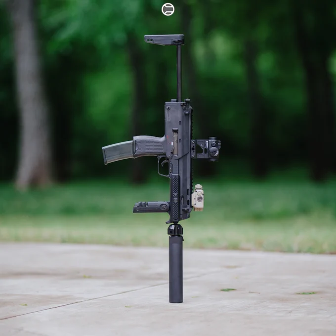 RailScales MP7 GIP MLOK Rails, G10 Solo's M-LOK Scales (Matrix, Black FR4, 1.5-Slot), LAO Sling Mount | Heckler & Koch MP7 MP7A1 Post Sample MG w/ B&T USA MP7 Rotex Suppressor, Surefire XVL2-IRC WeaponLight, Aimpoint Micro T-2 RDS on Unity Tactical FAST Micro Mount, HK 40rd MP7 Magazine and HK MP7 3-Position Stock. 