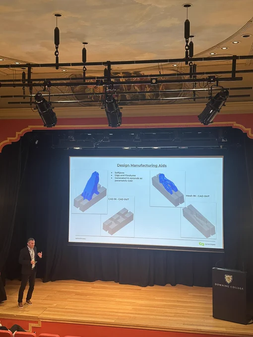 A person presenting on a stage