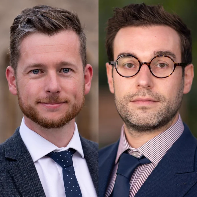 Head and shoulder photos of Chris Steward (left) and Tim Blower (right). Both are wearing dark navy jackets and navy ties against blurred backgrounds.