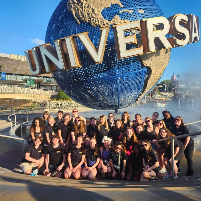 Rockwood choir students smile at a competition.