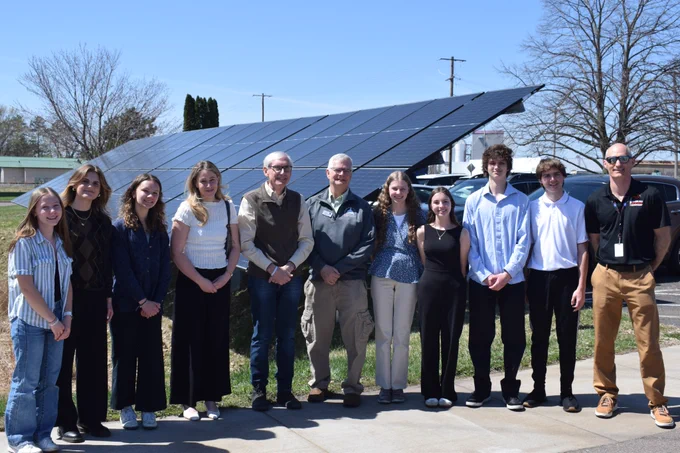 Gov. Evers poses for a group photo with Chippewa Falls High School students