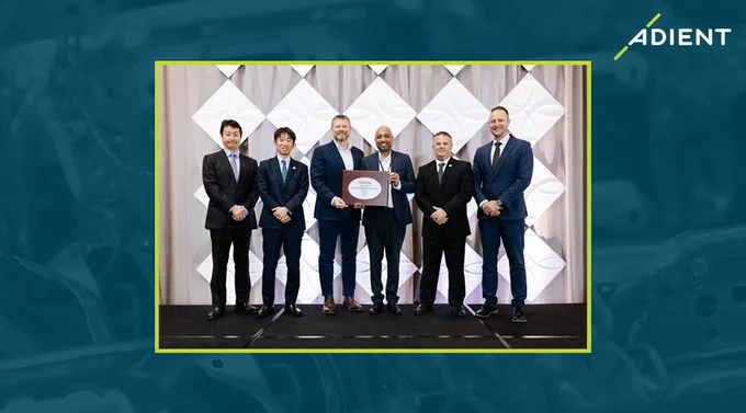 Adient accepting the Global Partnership Appreciation Award from Toyota.