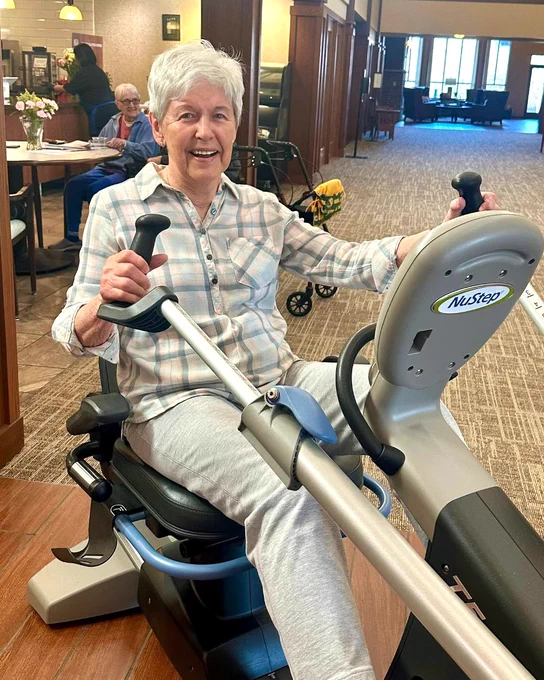 Elderly woman exercising on the NuStep T5 recumbent cross trainer seated stepper at Dickson Hollow for NIFS Pump it for Parkinsons 2026