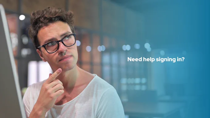 Person on laptop or phone in a low-stress setting, trying to log in.
Overlay: Need helping signing in? 
