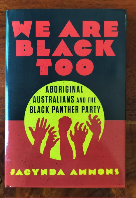 Book cover in bold red, yellow, and black