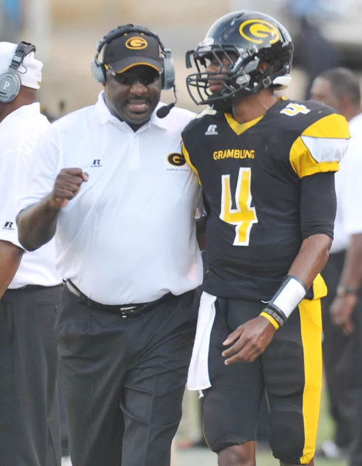 Photo of Doug and D.J. Williams at Grambling State University. Doug is coaching and D.J. is on the team.