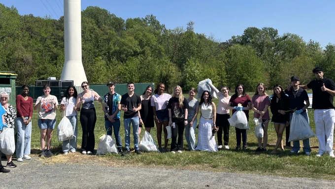 around 20 volunteers who helped clean up the living labs nature trail