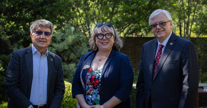Honors College Dean Lynn, National Fellowships Director Jennifer Bess and USC President Michael Amiridis posing for a photo.