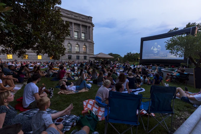 Visitors flock to the north lawn for a viewing of "Shrek" during the kickoff of the Library's Summer Movies on the Lawn series. Photo by Shawn Miller/Library of Congress.