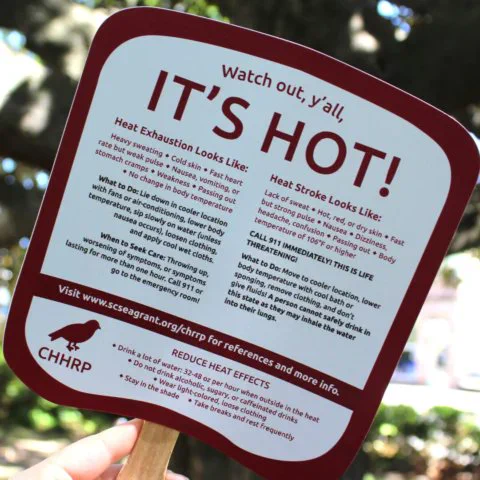 This hand fan from the Charleston Heat-Health Research Project educates on the signs of heat exhaustion and heat stroke and what to do to reduce heat effects.