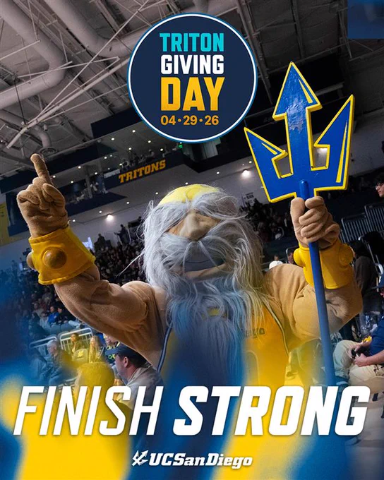 Mascot holding a trident at a sports event with a "Triton Giving Day 04.29.26" sign above and "Finish Strong" text at the bottom, with the UC San Diego logo.