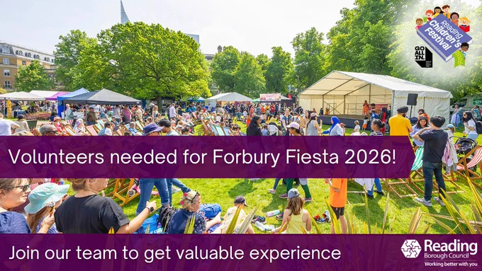 A busy outdoor festival scene in a sunny park, with many people seated on deckchairs facing a stage and various tents and stalls in the background. Large trees surround the open grassy area. Bold purple banners across the image read “Volunteers needed for Forbury Fiesta 2026!” and “Join our team to get valuable experience.” In the top-right corner is the Reading Children’s Festival logo, and in the bottom-right corner is the Reading Borough Council logo.