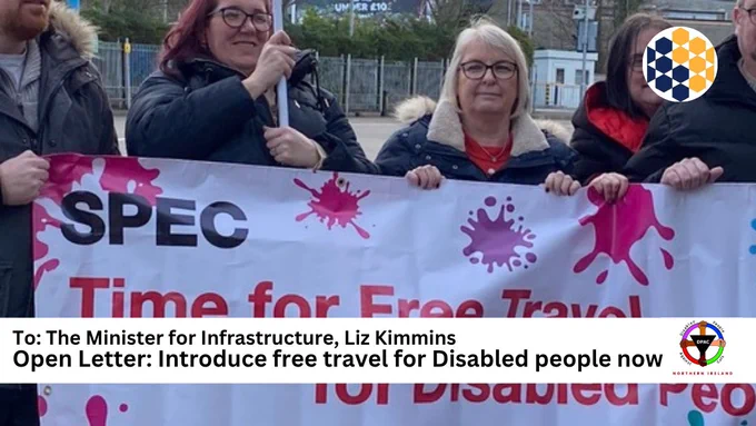 A group of people hold a banner reading "Time for Free Travel for Disabled People" with a call to introduce free travel for disabled people addressed to a government minister.