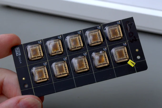 wafer.space chips populated in a COB carrier PCB.