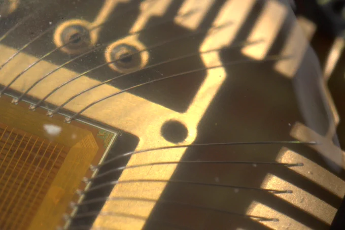 wafer.space chips populated in a COB carrier PCB.