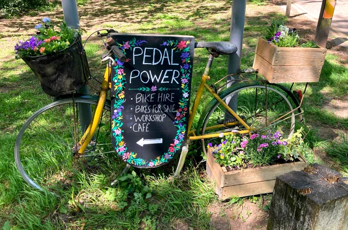 New 'flower-power' Pedal Power sign at entrance to our Pontcanna site car park
