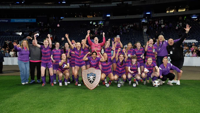Wallace Senior Girls celebrate with the trophy at Hampden. Picture credit: Ian Cairns