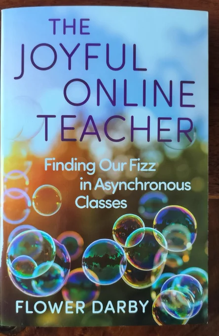 Bubbles and bubbles and blue sky on a book cover for Flower Darby, "The Joyful Online Teacher: Finding Our Fizz in Asynchronous Classes"