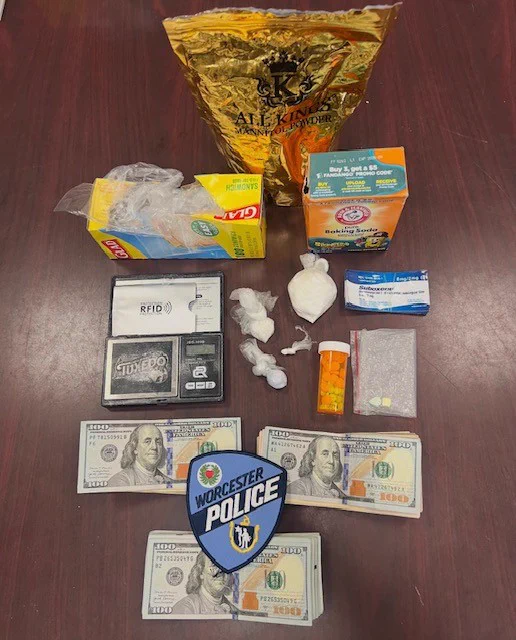 A photo shows the drugs, cash and other paraphernalia recovered by the Worcester Police Department.  